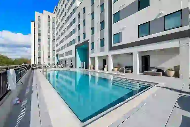 Lay out or bring the squad for a day by the resort-style pool